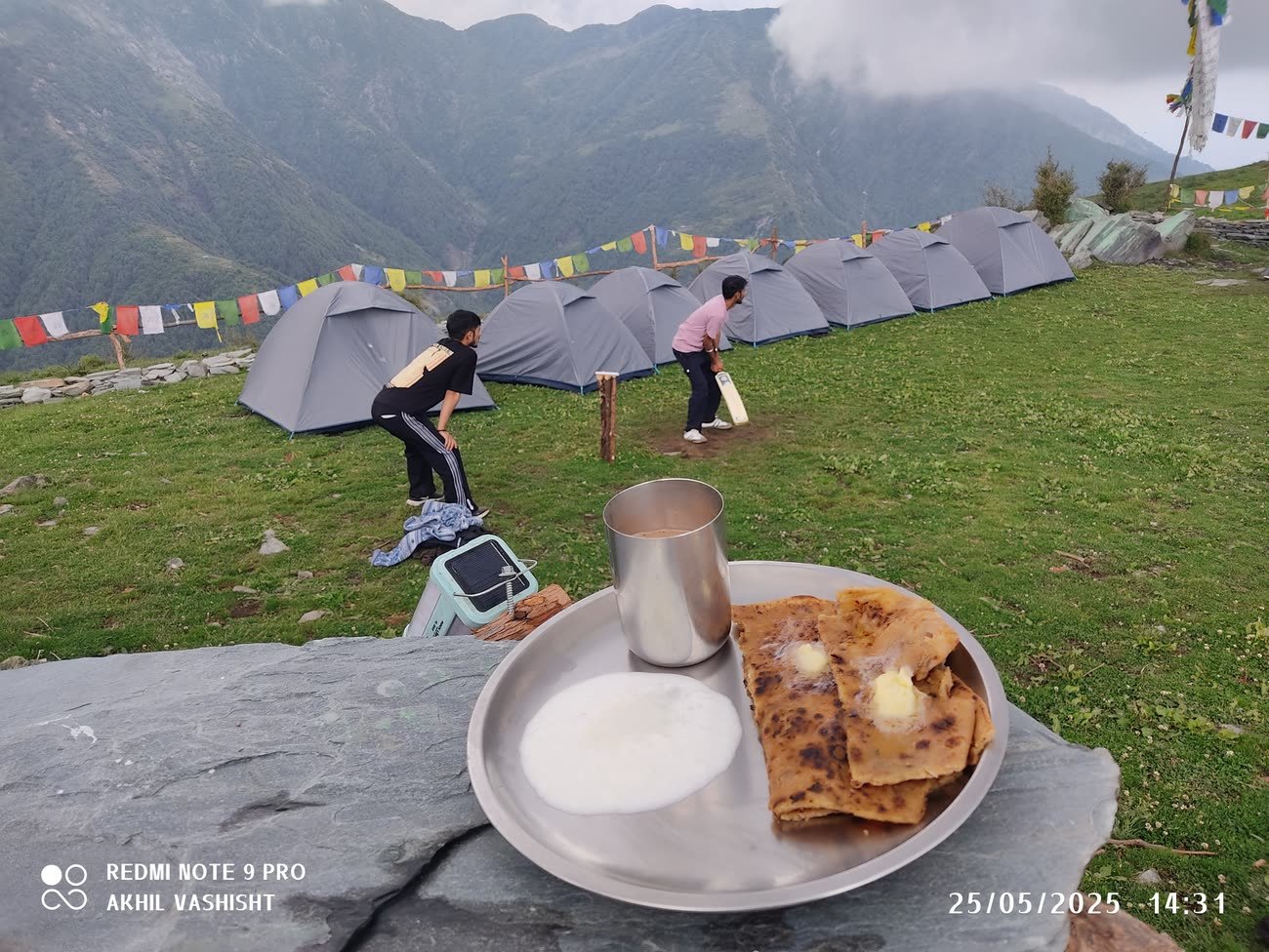 Morning breakfast of parathas, curd and tea served beside the tents